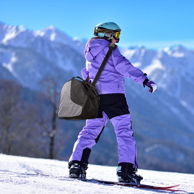 Ergonomic ski gear carry bag