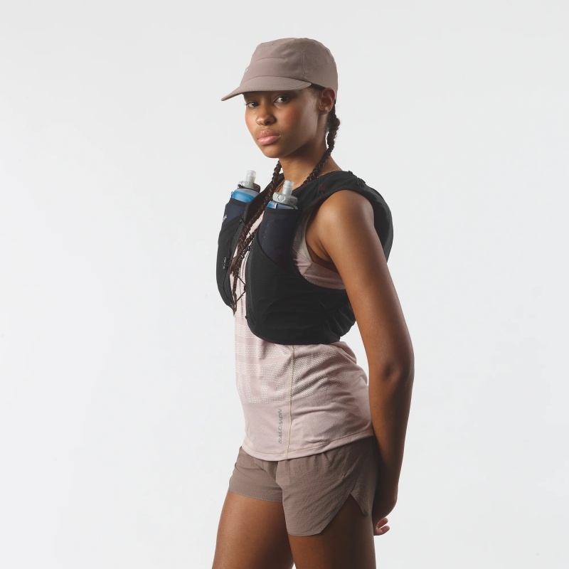 Athletic training hydration vest with bottle storage